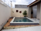 Casa com área de lazer e piscina em C. Novos por R$-300.000