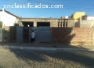 Casa lajeada em área nobre de C. Novos R$-250.000